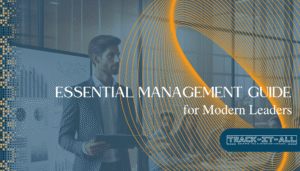 A man in a suit stands by a screen with charts; overlaid text reads "Essential Management Guide for Modern Leaders" with the Track-It-All logo at the bottom right.